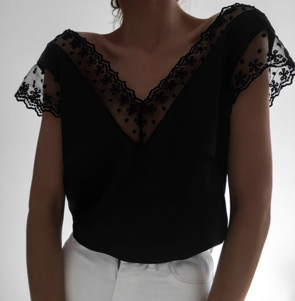 Hollow lace wavy deep V blouse